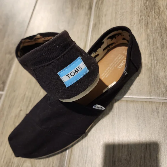 TOMS Black Slip-On Shoes - Picture 1 of 5